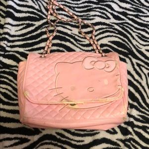 Pink hello kitty purse. Very used.
